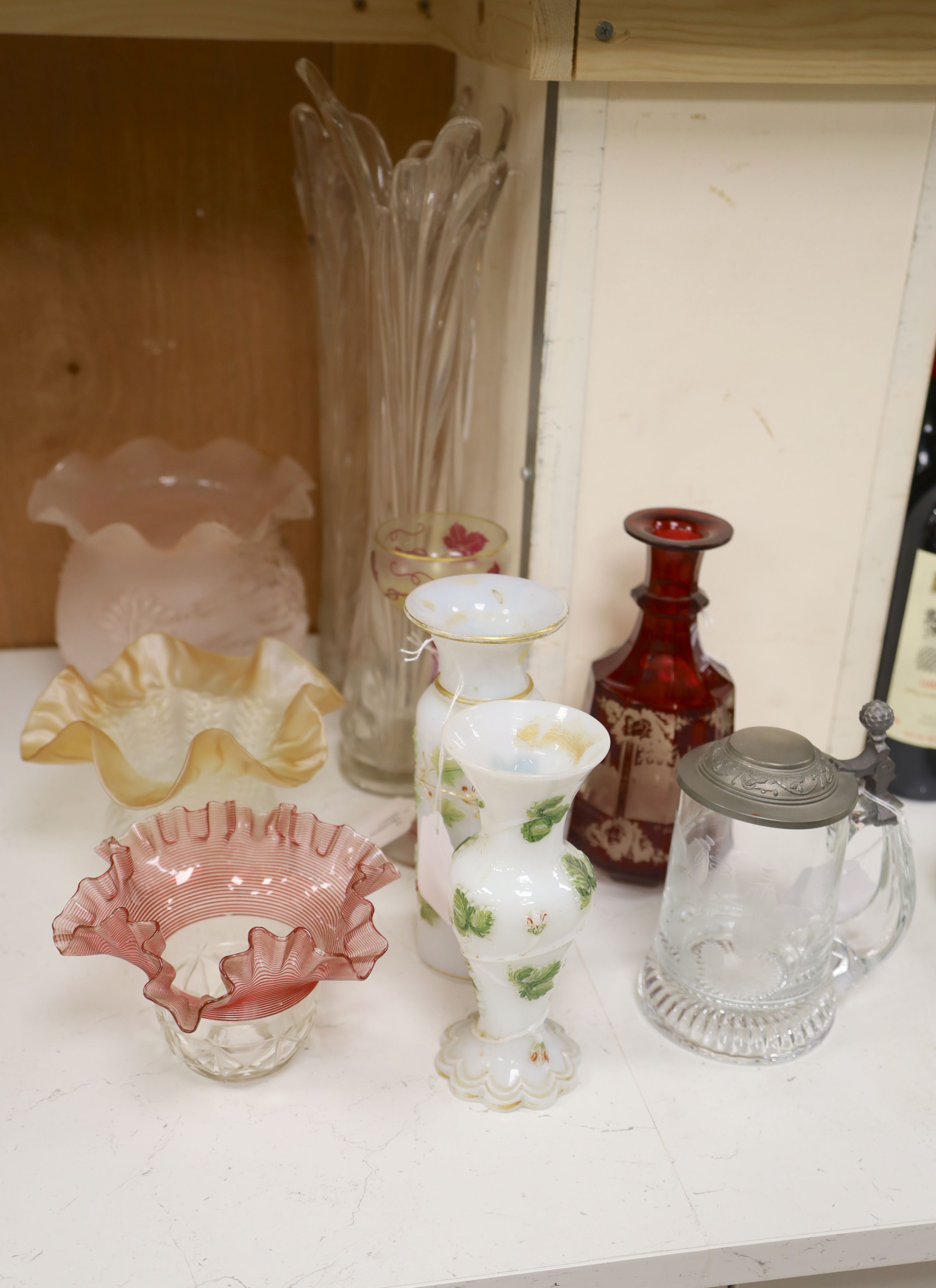 A collection of mixed glassware, including a Bohemian ruby flash decanter